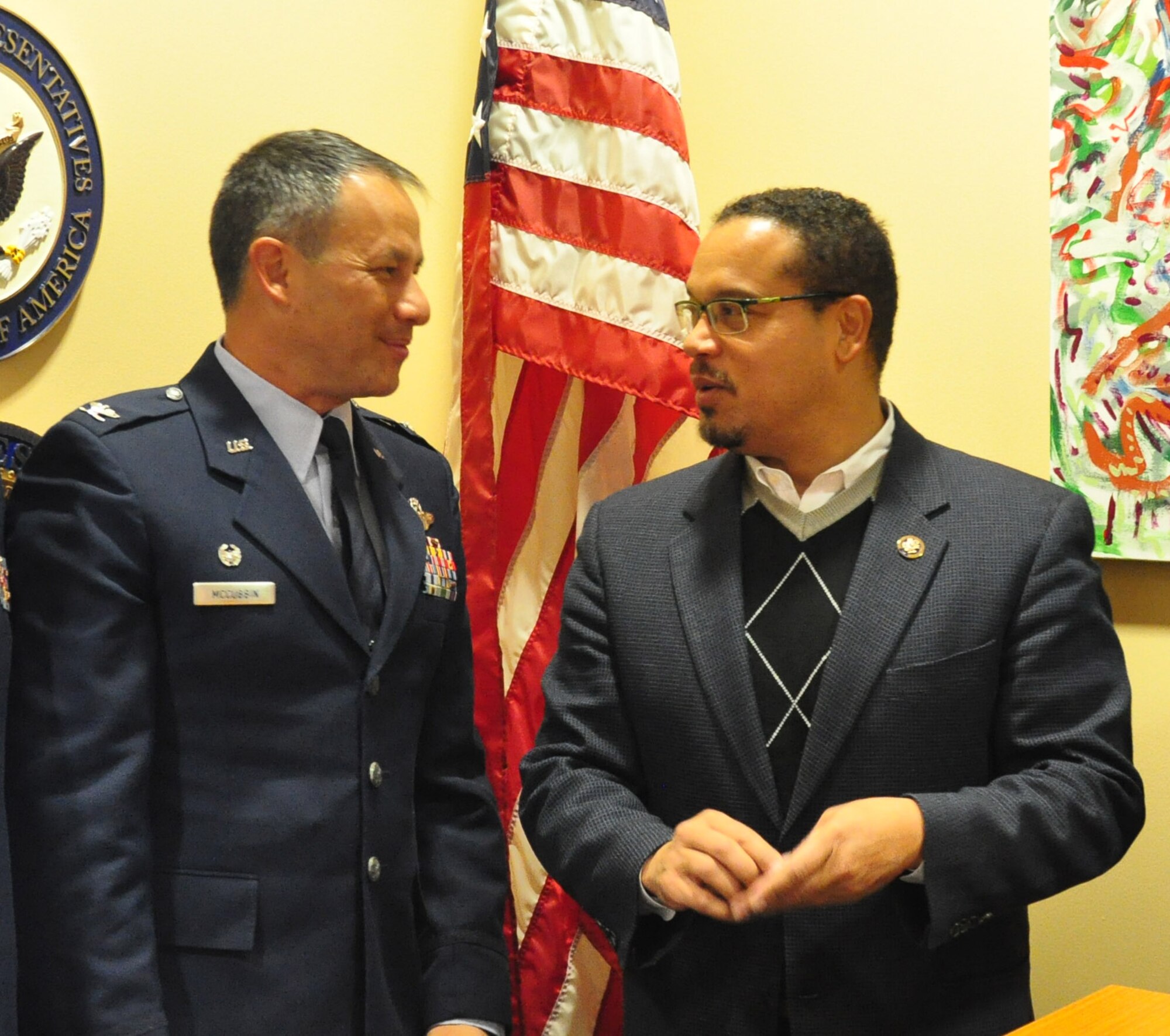Congressman Keith Ellison, Minn. 5th District, thanks Col. Todd McCubbin, 934th Airlift Wing commander, for presenting him with a wing coin during his visit Dec. 9.  Col. McCubbin visited Ellison's office along with Col. Keith Wesley, 934th Operations Group commander, and Command Chief Master Sgt. Bryan Payne as part of the 934th Airlift Wing Public Affairs congressional relations program. (Courtesy Photo).