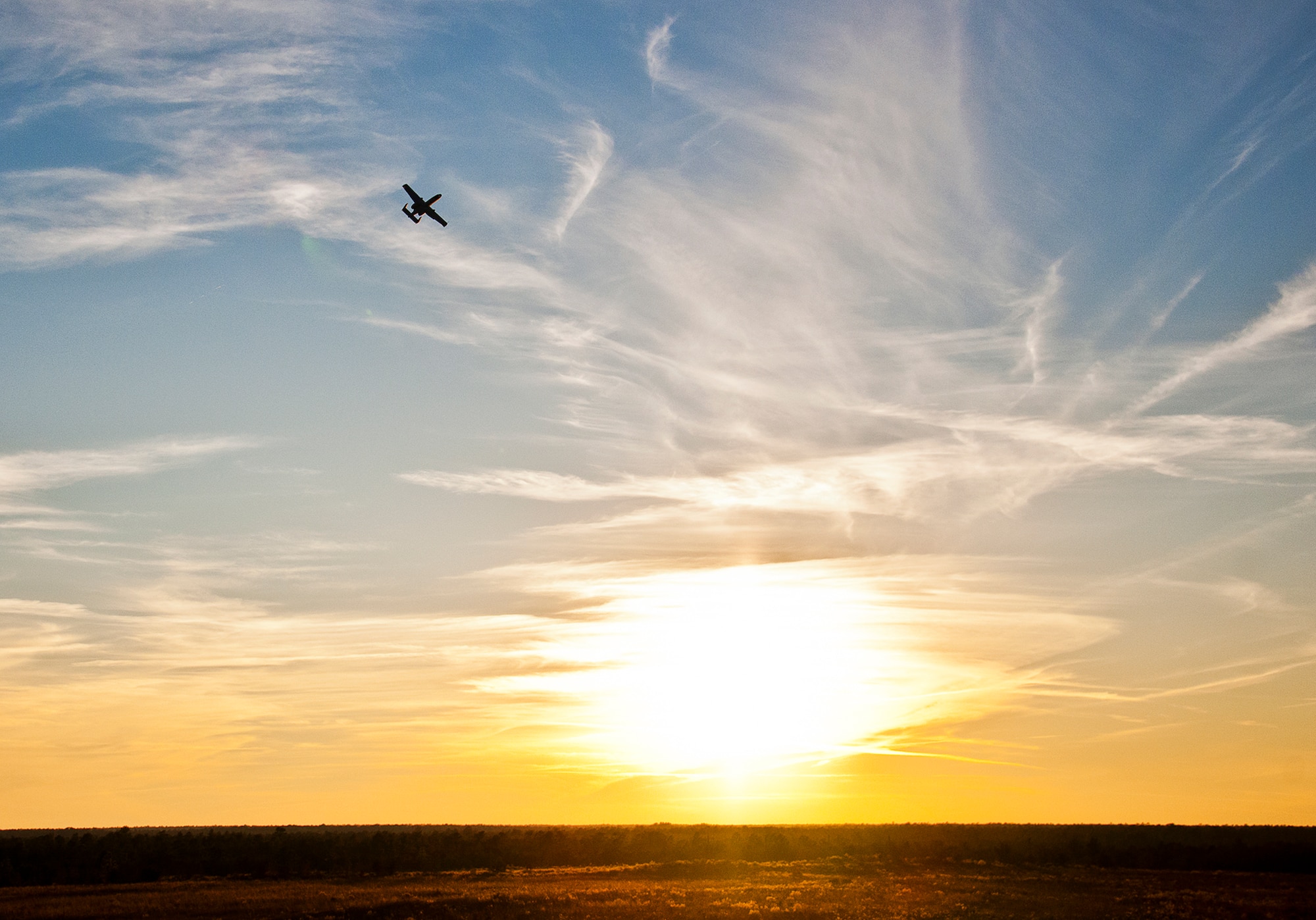 An A-10 Thunderbolt II, from the 40th Flight Test Squadron, pulls up after executing a strafing run during a training mission on the Eglin Air Force Base, Fla., range Dec. 10. The pilot also fired the 30mm cannon on multiple diving passes and completed two strafing runs during the afternoon sortie. (U.S. Air Force photo/Samuel King Jr.)