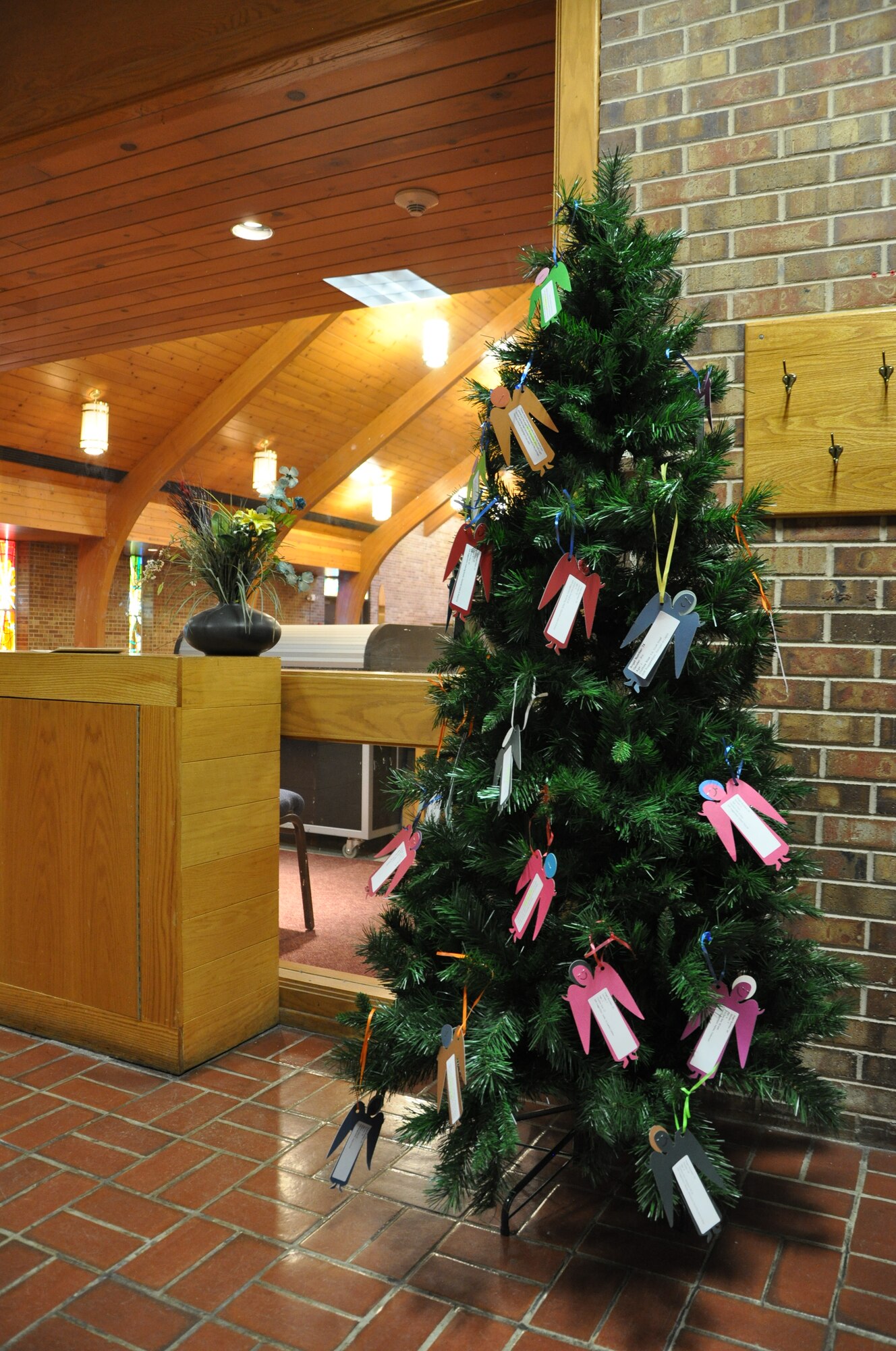 PETERSON AIR FORCE BASE, Colo. – Angel Trees located at the base chapel, BX and building 350 are available to give people the opportunity to help those less fortunate during the holiday season. The Angel Tree concept is simple, pick an angel cutout from the tree and purchase a gift for that girl or boy based on their age. All gifts must be returned to the tree where the angel was initially picked from by Dec. 19. Organizers ask that donations include a gift receipt and angel card attached to the gift before placing it under the tree. For information contact Tech. Sgt. David Boice at 556-4442. (U.S. Air Force photo/Tech. Sgt. Jared Marquis)