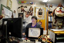 Rhonda Henneman, 319th Medical Group director of housekeeping reviews a list a work details at her office inside the Medical Treatment Facility at Grand Forks Air Force Base, N.D. Henneman has more than 26 years of Air Force contractor service. The native from Cadott, Wis., is the base’s Warrior of the Week for the second week of December 2013. (U.S. Air Force photo/Staff Sgt. Luis Loza Gutierrez) 