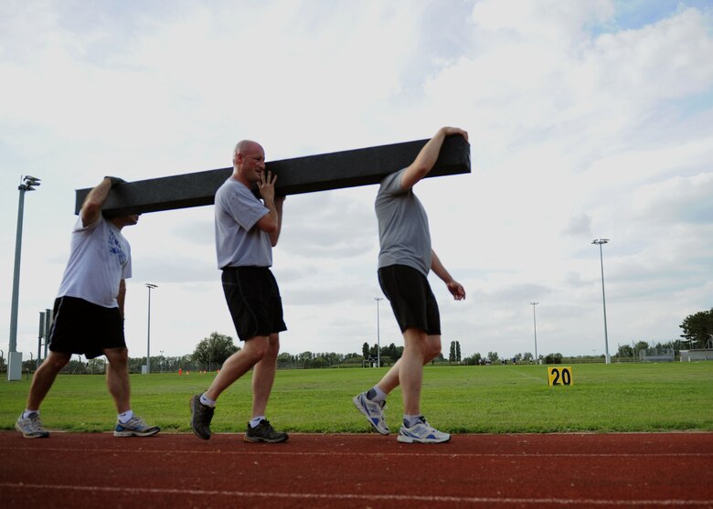 Col. Christopher Ireland, center, is the 352nd Special Operations Group commander. In his commentary, Ireland discusses how U.S. Air Force service members continuously accomplish amazing tasks under uncertainty and pressure, and are committed to holding themselves accountable and being good Wingmen. (U.S. Air Force photo by Airman 1st Class Preston Webb/Released)