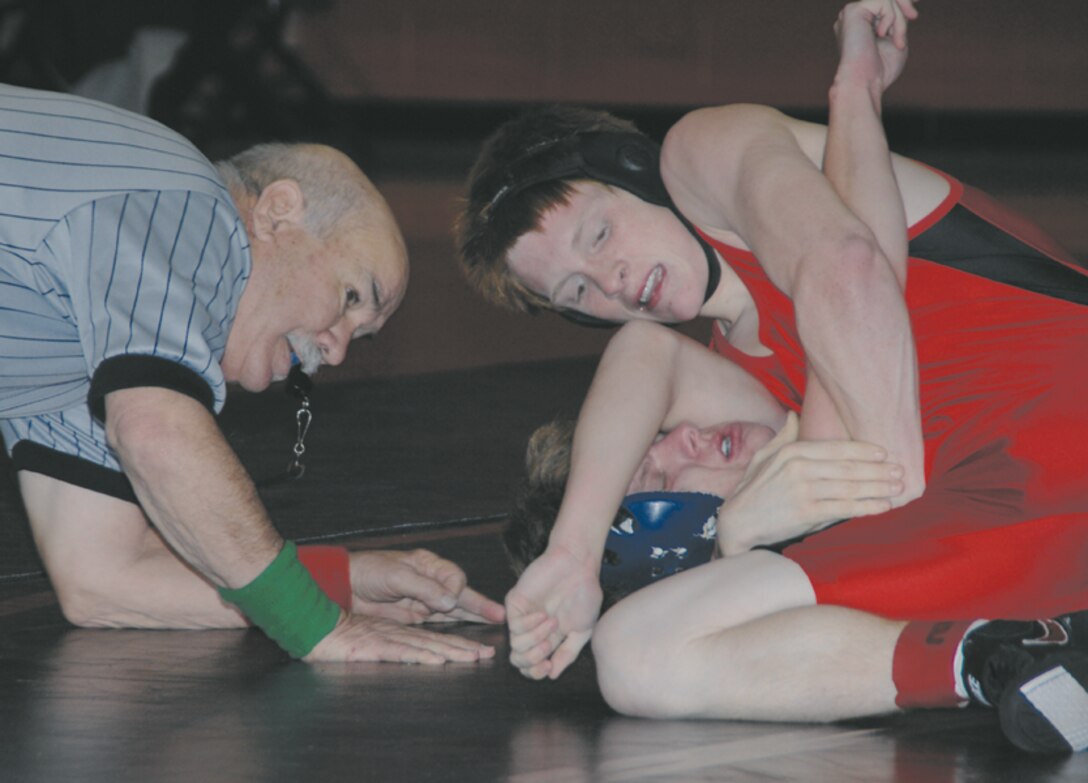 Wrestlers from Lee County, Tift, Thomas County Central and Colquitt high schools as well as youth wrestlers participate in a wrestling quad event held at Thomason Gym aboard Marine Corps Logistics Base Albany Dec. 10.