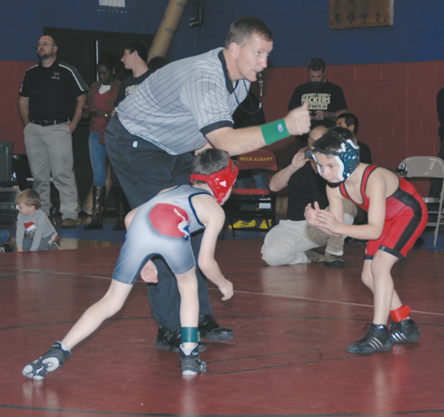 Wrestlers from Lee County, Tift, Thomas County Central and Colquitt high schools as well as youth wrestlers participate in a wrestling quad event held at Thomason Gym aboard Marine Corps Logistics Base Albany Dec. 10.