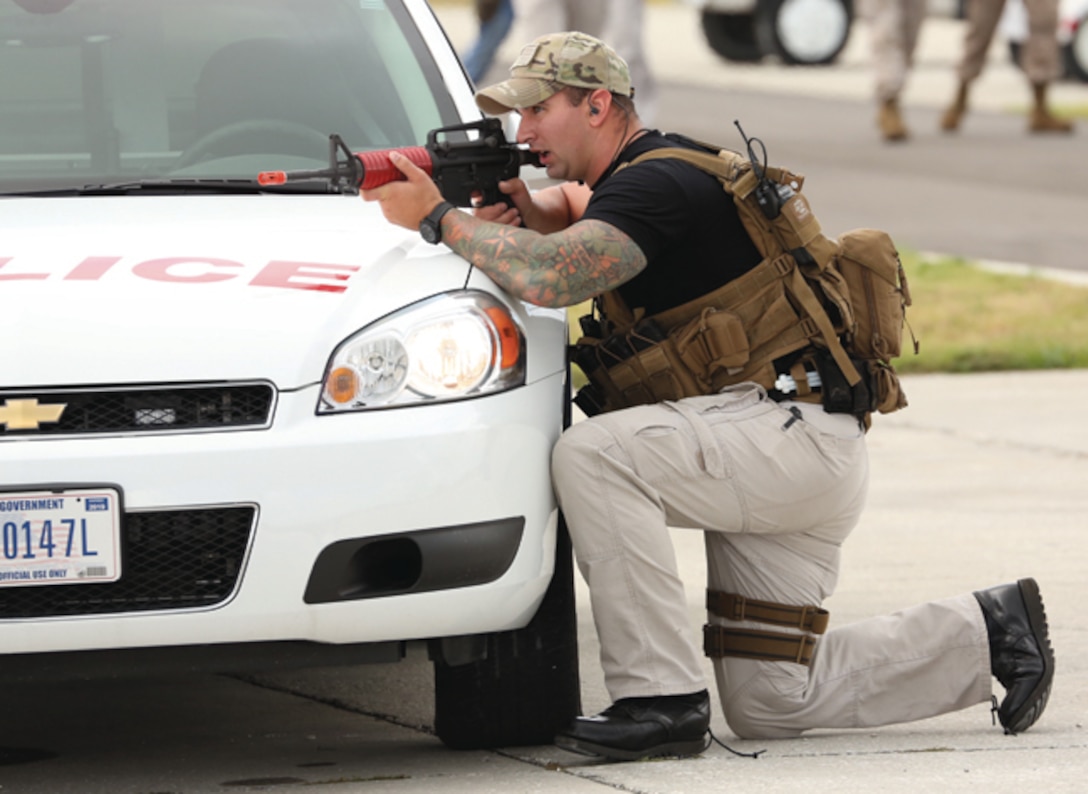Marines, Sailors, civilian-Marines, Coast Guard, Marine Corps Support Facility Blount Island police and Jacksonville rescue services participate in a comprehensive anti-terrorism/force protection exercise held here recently. Smoke on the Water 2013 is an exercise, which plays out a complex terrorist attack and hostage scenario in an effort to evaluate the installation’s ability to activate, recall and fully staff emergency response personnel during a time of crisis.