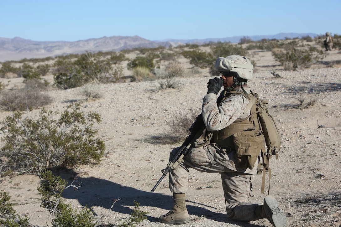 Sgt. Brandon Edgerton, convoy commander with Combat Logistics Battalion 5, Combat Logistics Regiment 1, 1st Marine Logistics Group, provides security for a tactical convoy as part of training leading up to Exercise Steel Knight 2014 aboard Marine Air Ground Combat Center Twentynine Palms, Calif., Dec. 6, 2013. The training provided the Marines of CLB-5 with experience on what to expect when they are deployed to expeditionary environments and how to support forward-deployed units such as the 1st Marine Division.