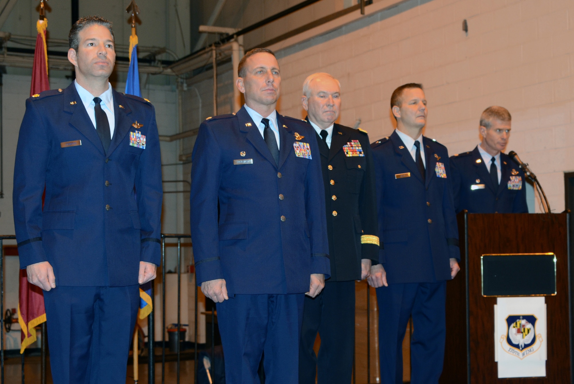 Maj. Chris Cisneros (left) and Lt. Col. Paul C. Zurkowski stand at the position of attention during an awards ceremony Dec. 8, 2013, at Warfield Air National Guard Base, Md. They were awarded the Distinguished Flying Cross with Valor for their actions in a fire fight while deployed to Afghanistan. Cisneros and Zurkowski are A-10C Thunderbolt II pilots with the Maryland Air National Guard’s 104th Fighter Squadron. (U.S. Air National Guard photo/Tech Sgt. David Speicher)