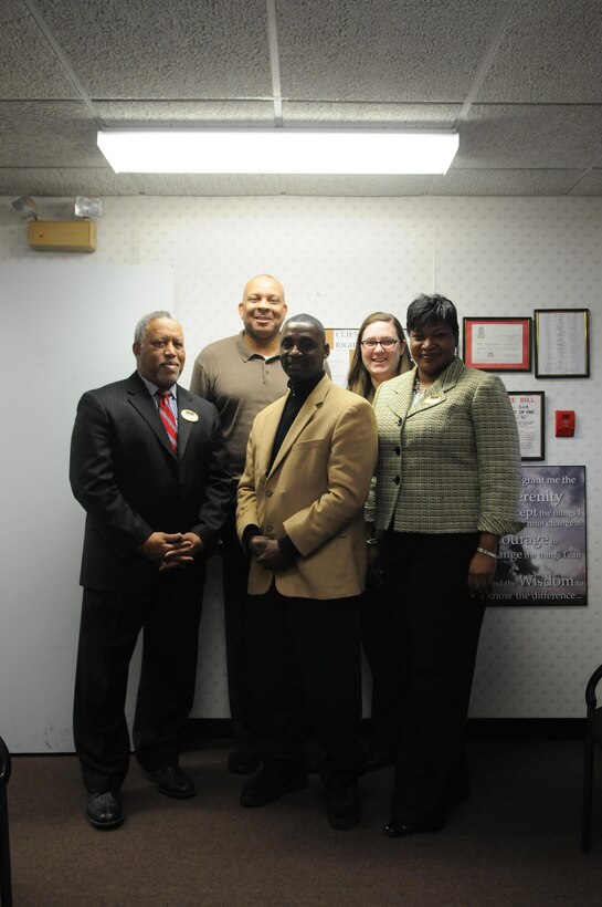 The staff of Quantico’s Consolidated Substance Abuse Counseling Center earned an enthusiastic accreditation from the Commission on Accreditation of Rehabilitation Facilities International, which arrived at the end of November. From left are substance abuse counselor Timothy Banks, senior substance abuse counselor Thomas Brown, clinical supervisor Ricardo Hicks, substance abuse counselor Rebecca Cunningham and Center Director Jacqueline Williams. Not pictured are drug demand reduction coordinator Pamela Moment, alcohol prevention specialist Milton Young, and administrative specialists Rachel Jones and Rhonda Cooper. 