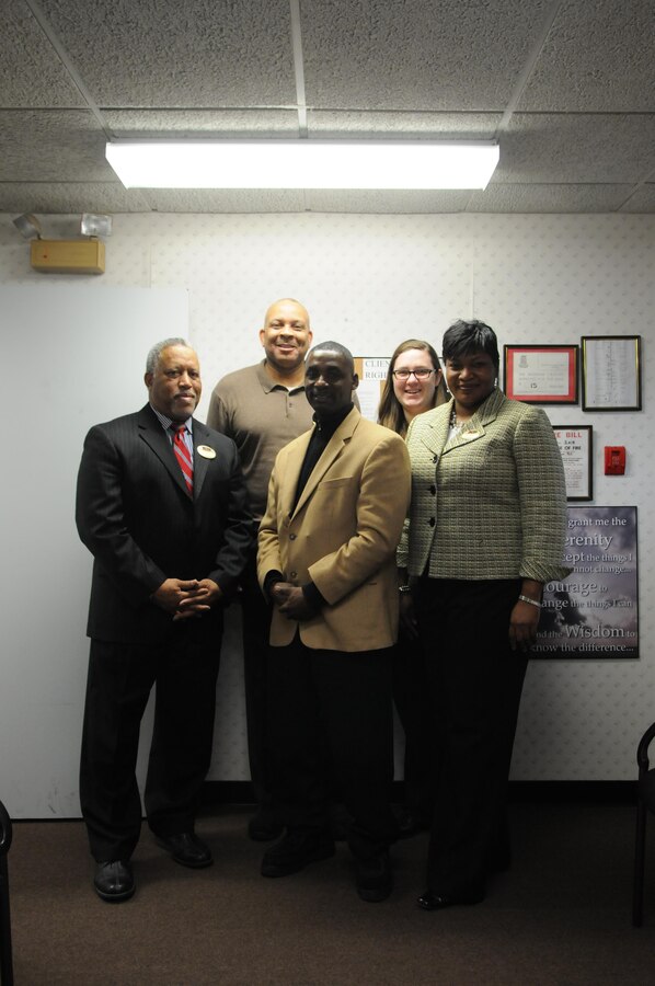 The staff of Quantico’s Consolidated Substance Abuse Counseling Center earned an enthusiastic accreditation from the Commission on Accreditation of Rehabilitation Facilities International, which arrived at the end of November. From left are substance abuse counselor Timothy Banks, senior substance abuse counselor Thomas Brown, clinical supervisor Ricardo Hicks, substance abuse counselor Rebecca Cunningham and Center Director Jacqueline Williams. Not pictured are drug demand reduction coordinator Pamela Moment, alcohol prevention specialist Milton Young, and administrative specialists Rachel Jones and Rhonda Cooper. 