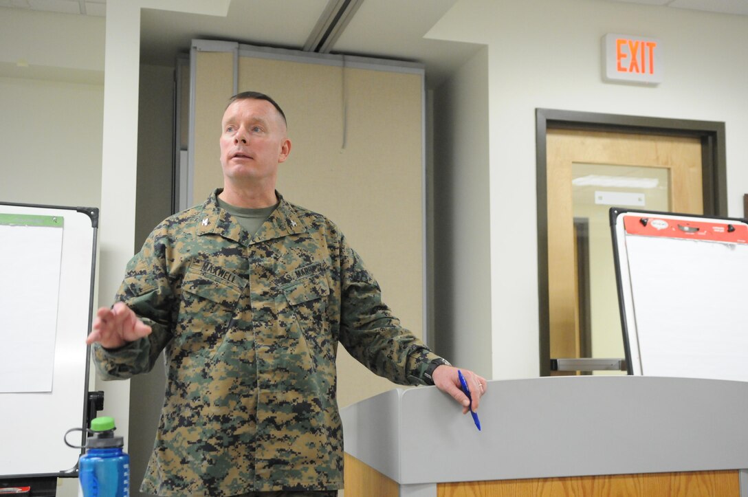 Col. David Maxwell, commander of Marine Corps Base Quantico, talks with parents at a town hall meeting in the Religious and Family Services Annex on Dec. 2. 