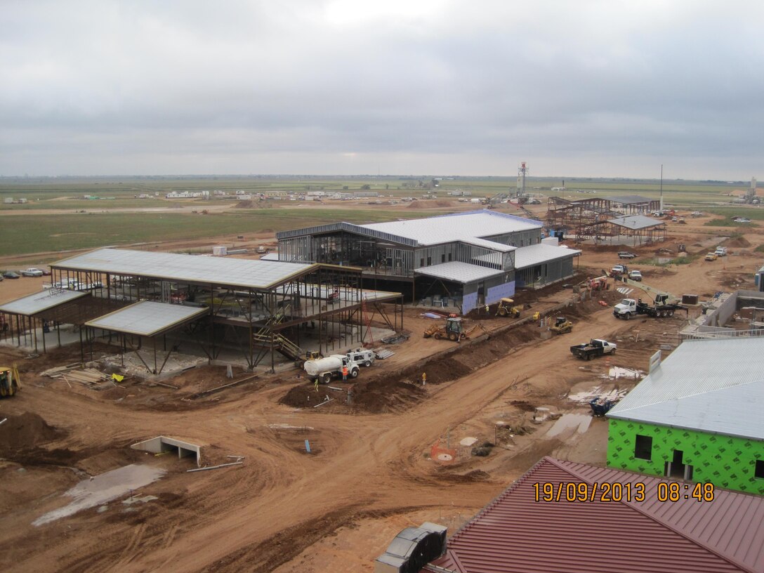 CANNON AIR FORCE BASE, N.M., -- Entry in the Albuquerque District's 2013 Photo Drive. Photo by James Vigil, Sept. 19, 2013.

"Photo of the Consolidated Squadron Operations Construction Project. Two facilities involved in one contract designed and administered by the Engineering and Construction Division of the Albuquerque District. Aerial view from the roof of an adjacent two bay project that is also administered by the District."
