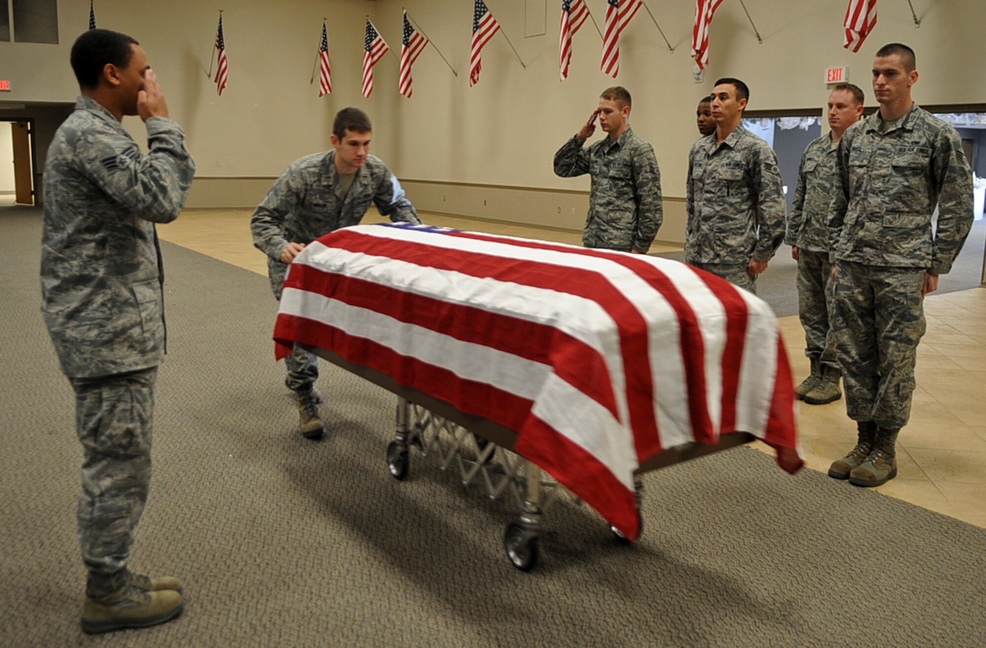 Airmen from the Barksdale Honor Guard practice a hearse arrival sequence on Barksdale Air Force Base, La., Dec. 12, 2013. The roles of the Honor Guard include conducting memorial services for deceased veterans and retiring personnel. (U.S. Air Force photo/Senior Airman Kristin High)
