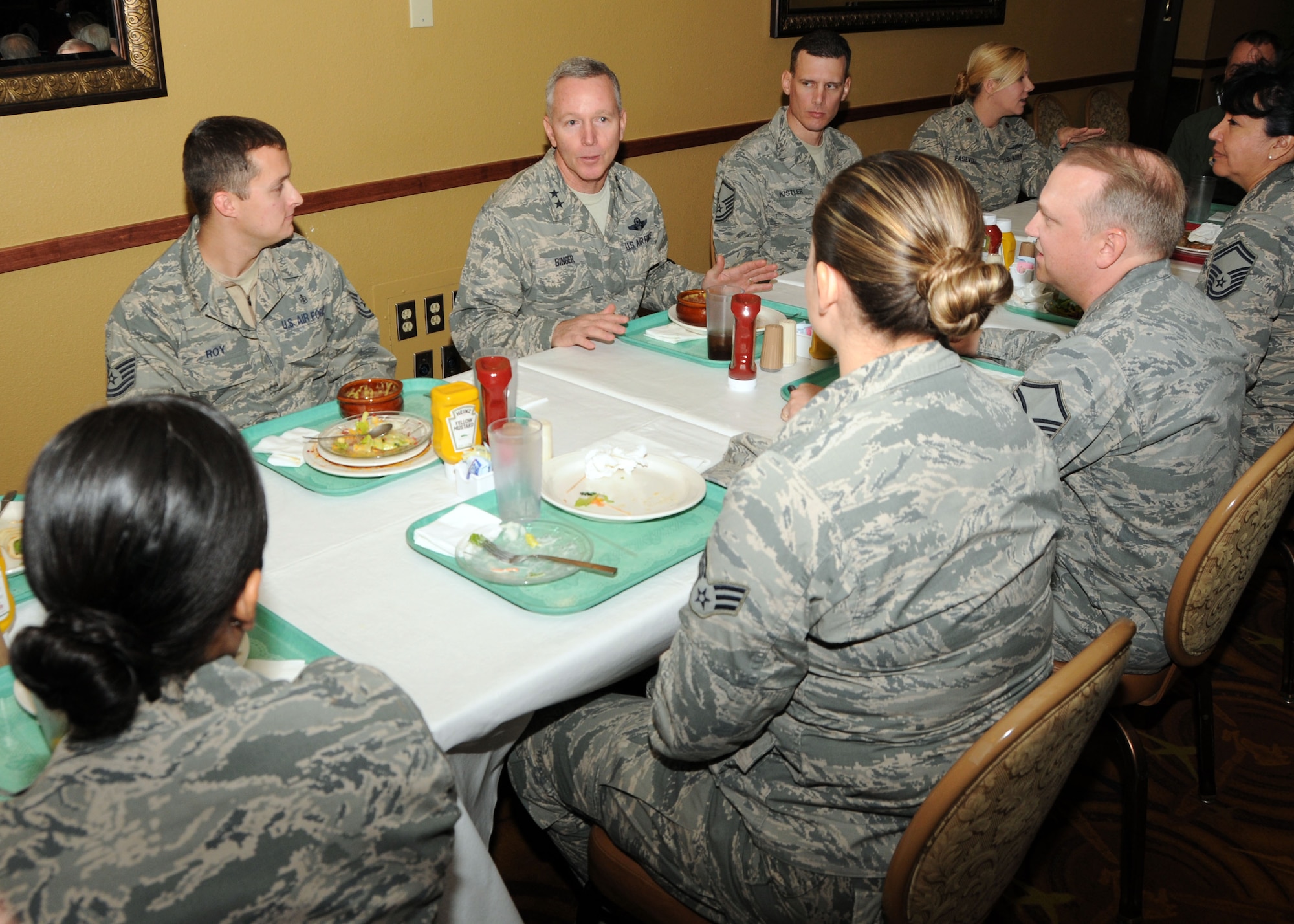 Maj. Gen. William Binger, 10th Air Force Commander, has lunch and talks with members of the 944th Fighter Wing at Club 56 Dec. 9 at Luke Air Force Base, Ariz. The members used this forum to bring up issues pertaining to their benefits and the wing. (U.S. Air Force photo taken by Tech. Sgt. Louis Vega Jr.)