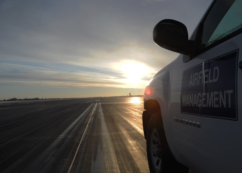 The 5th Operations Support Squadron Airfield Management works long hours to keep the active runway and taxi way clear of debris so the Minot Air Force Base mission is completed daily. Patrolling the runway for debris and icy surfaces is done throughout the workday and logs are kept to keep track of all data. (U.S. Air Force photo/Airman 1st Class Andrew Crawford)

