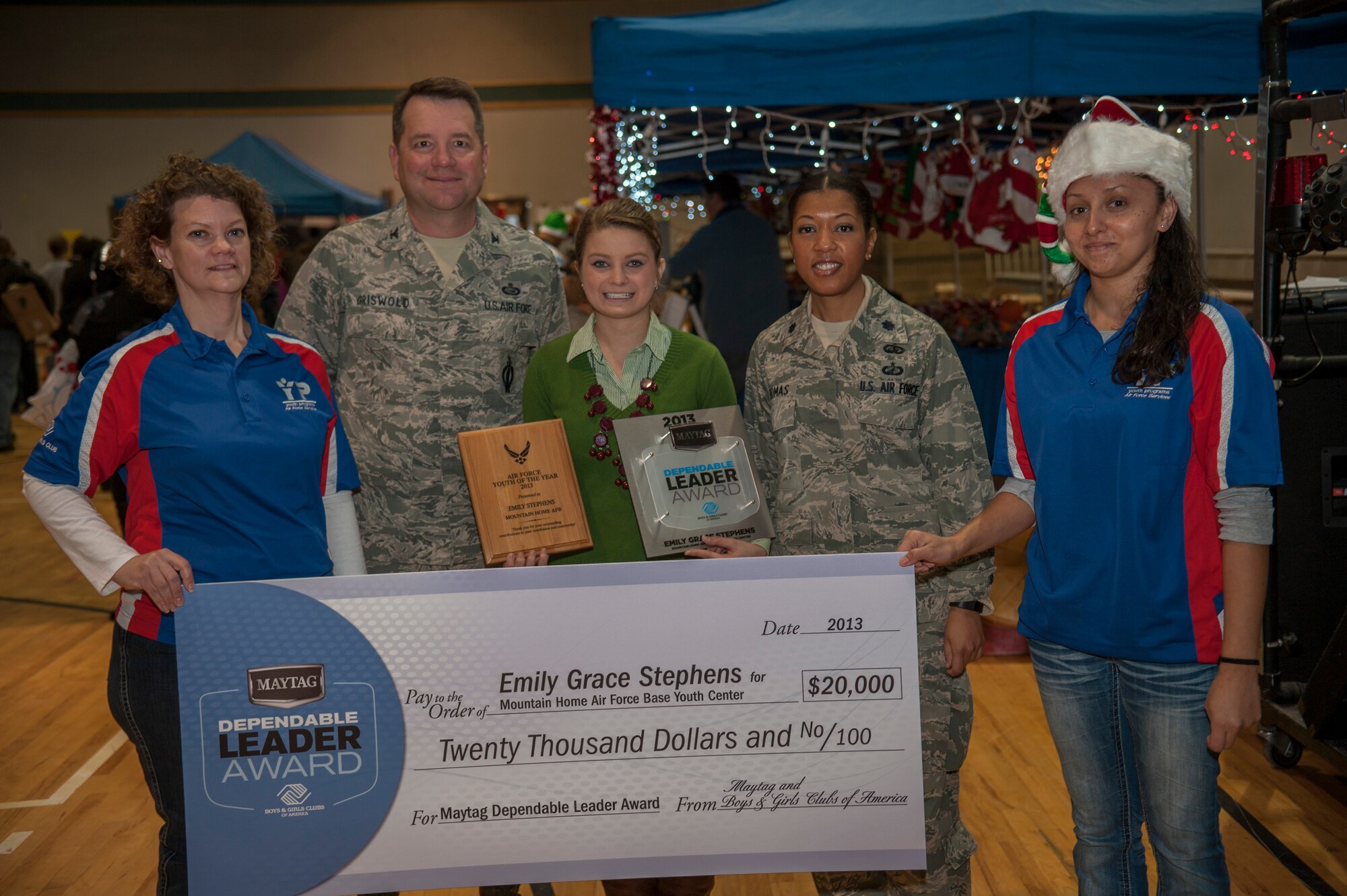 The 366th Force Support Squadron Youth Center receives a $20,000 grant after Emily Stephens won the 2013 Maytag Dependable Leader Award at Mountain Home Air Force Base, Idaho, Nov. 7, 2013. (U.S. Air Force photo by Staff Sgt. Roy Lynch/Released) 