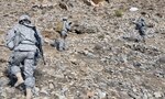 Redman and her team navigate a rugged terrain and walk and climb up steep
mountains to arrive at their destinations in Afghanistan.
Photo by Army Capt. Peter Shinn