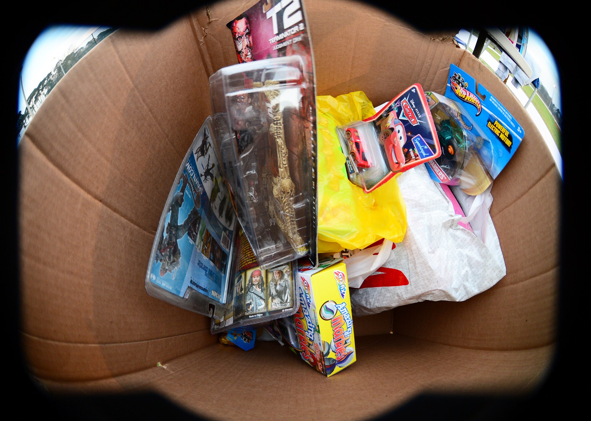 Boxes filled with toys are donated by Liberty Airmen at the 5K Trot for Toys at Royal Air Force Lakenheath, England, Dec. 12, 2013. The toys were donated to the West Suffolk Hospital Children’s Rainbow Ward, and the Cambridge University Hospital Children’s Cancer Ward. (U.S. Air Force photo by Airman 1st Class Dawn M. Weber/Released)