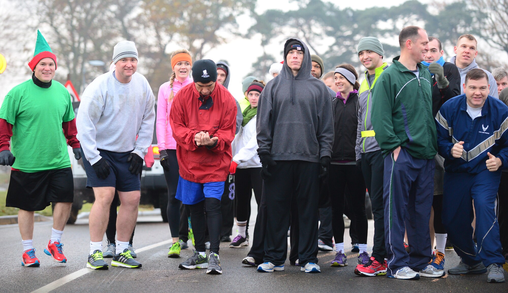 Liberty Airmen gather at the start point of the 5K Trot for Toys at Royal Air Force Lakenheath, England, Dec. 12, 2013. Toys were donated by the runners for the West Suffolk Hospital Children’s Rainbow Ward, and the Cambridge University Hospital Children’s Cancer Ward. (U.S. Air Force photo by Airman 1st Class Dawn M. Weber/Released) 