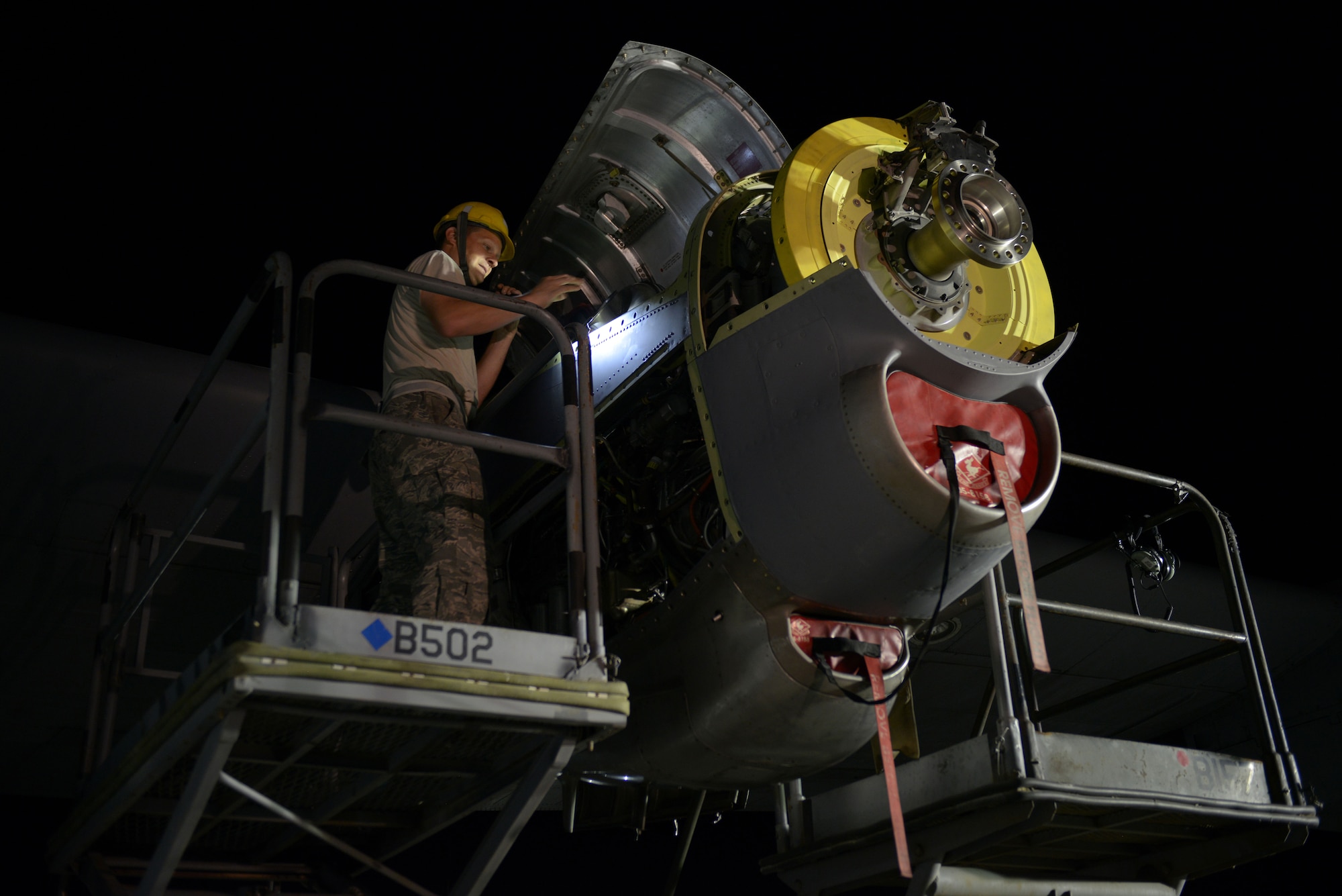 Tech. Sgt. Joseph Griffin, 379th Expeditionary Aircraft Maintenance Squadron, 746th Expeditionary Aircraft Maintenance Unit propulsion craftsman, checks the oil level in a newly installed C-130 engine after an engine change at the 379th Air Expeditionary Wing, Southwest Asia, Dec. 11, 2013. The engine was changed out in 12 hours and the aircraft was ready to fly on schedule. Griffin is deployed from Keesler Air Force Base, Miss., and a Spanish Fort, Ala., native. (U.S. Air Force photo/Master Sgt. David Miller)