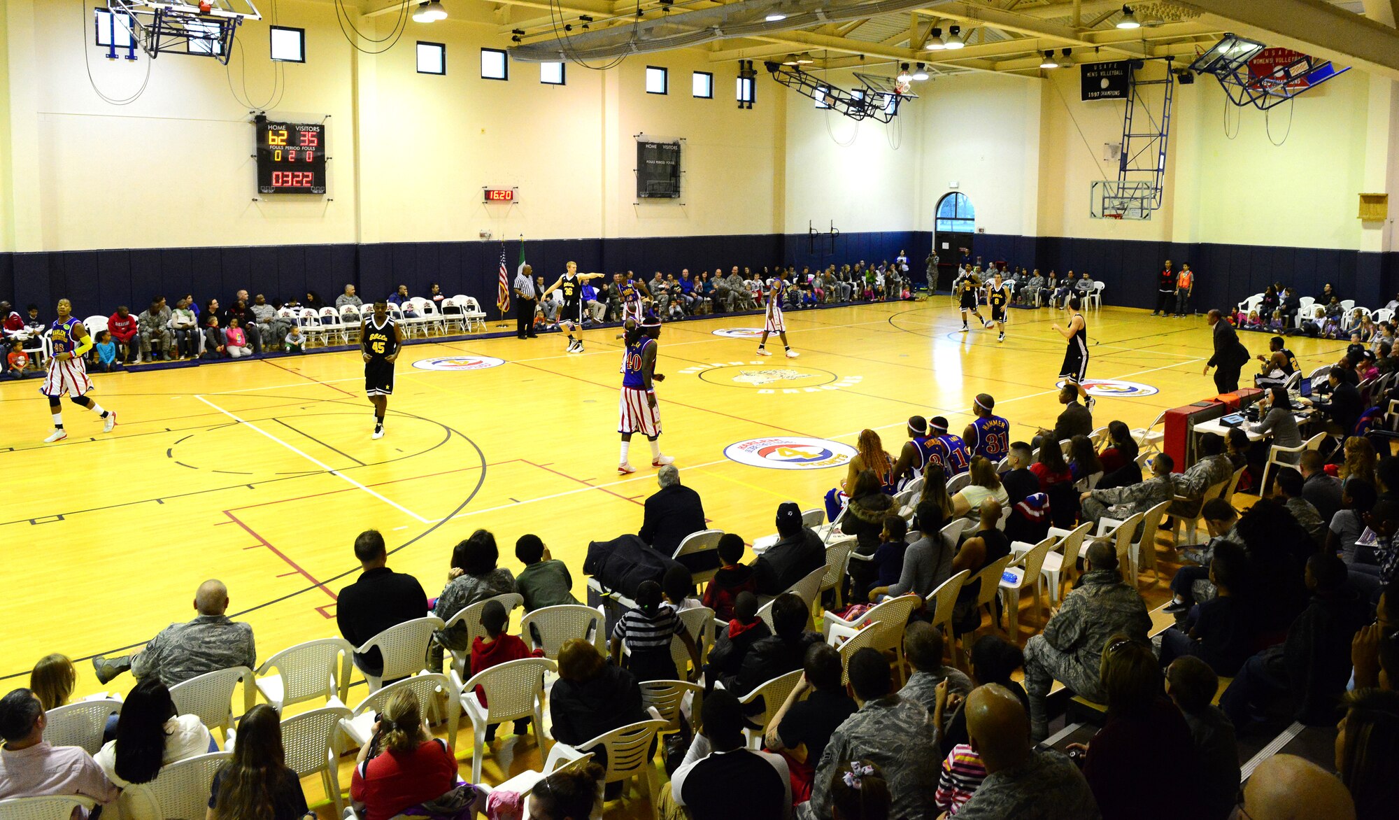 More than 1,000 Team Aviano and Italian community members were in attendance during the 12th Annual Harlem Globetrotters Holiday Tour Dec. 10, 2013, at Aviano Air Base, Italy. Sponsored by Navy and Armed Forces Entertainment, with support from the 31st Force Support Squadron, the Globetrotters hosted two shows for Team Aviano. (U.S. Air Force photo/Senior Airman Michael Battles)
