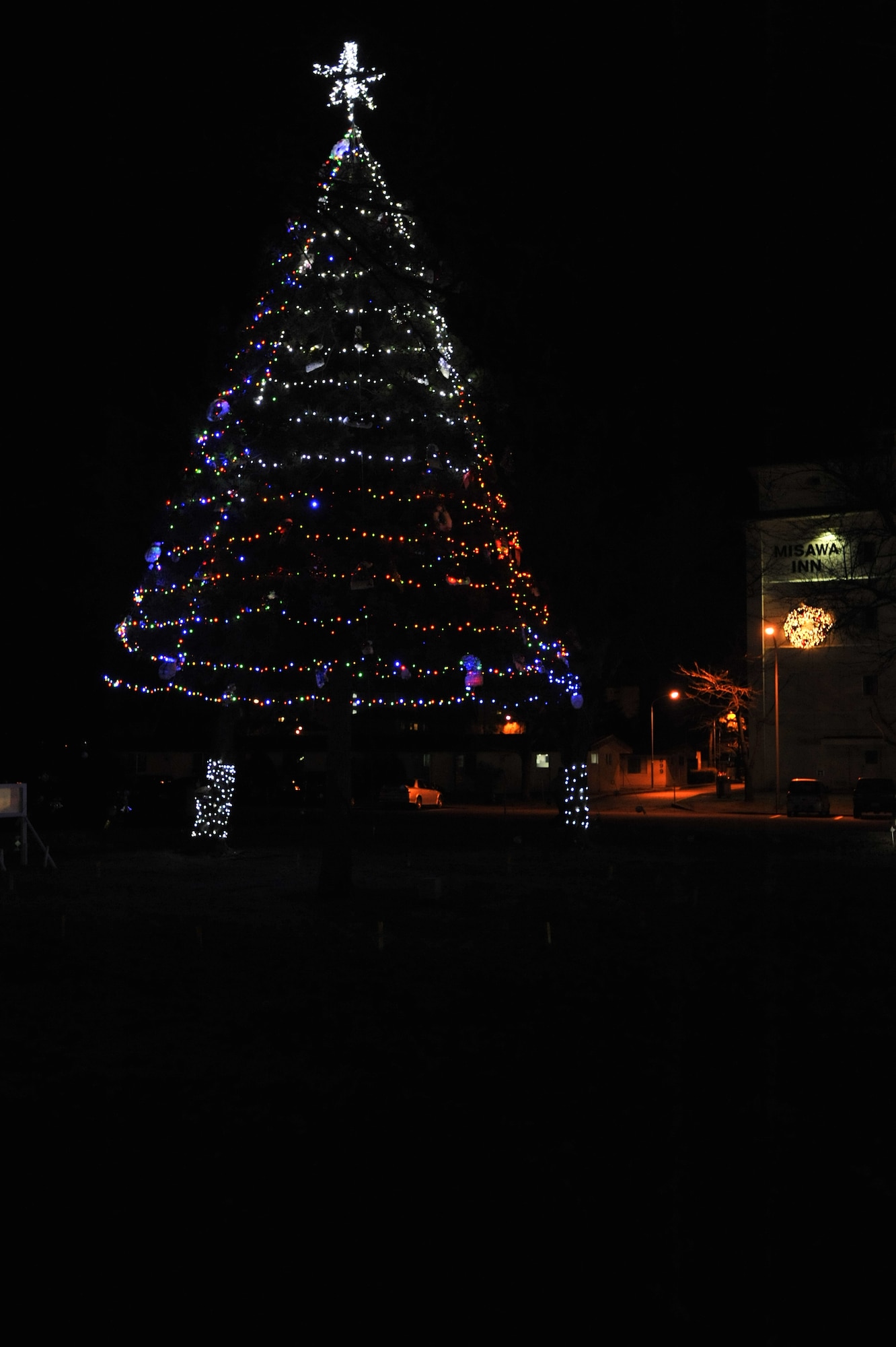 More than 500 family members braved the weather to witness the annual tree lighting ceremony at Misawa Air Base, Japan, Dec. 6, 2013. Youth were greeted by Santa Clause and his helpers, Christmas carols and hot chocolate.  (U.S. Air Force photo by Staff Sgt. Tong Duong)