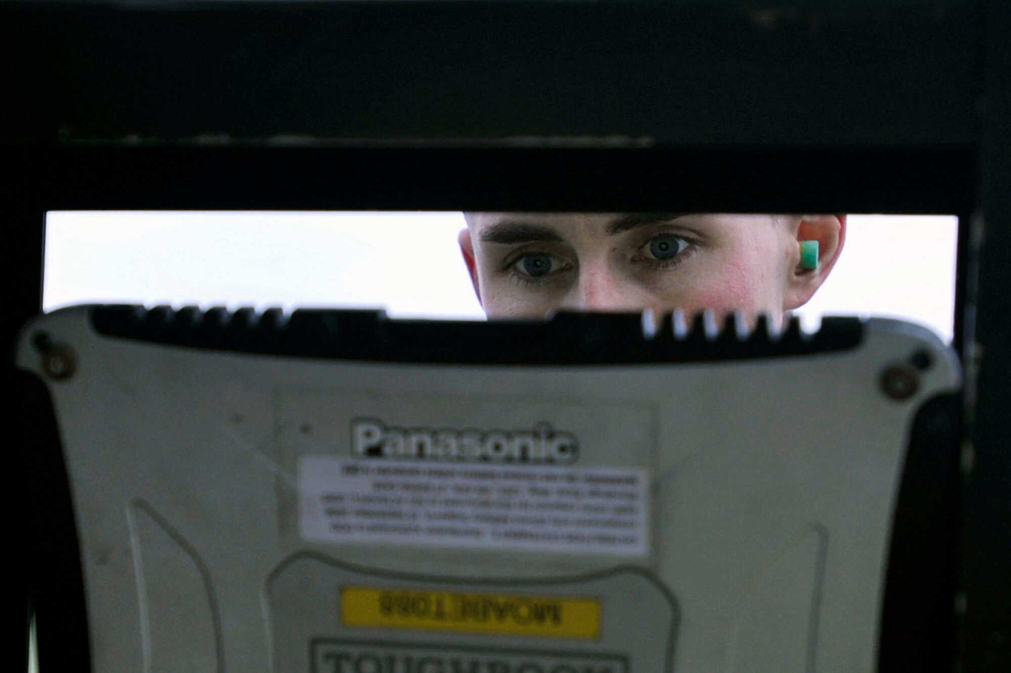 MISAWA AIR BASE, Japan – U.S. Air Force Staff Sgt. Thomas Larson, 14th Aircraft Maintenance Unit crew chief, consults his technical order while inspecting an F-16 Fighting Falcon after it completed a sortie at Misawa Air Base, Japan, Dec. 10, 2013. Larson was recently selected to become the dedicated crew chief for the 35th Operations Group commander’s flagship jet. (U.S. Air Force photo by Staff Sgt. Tong Duong)