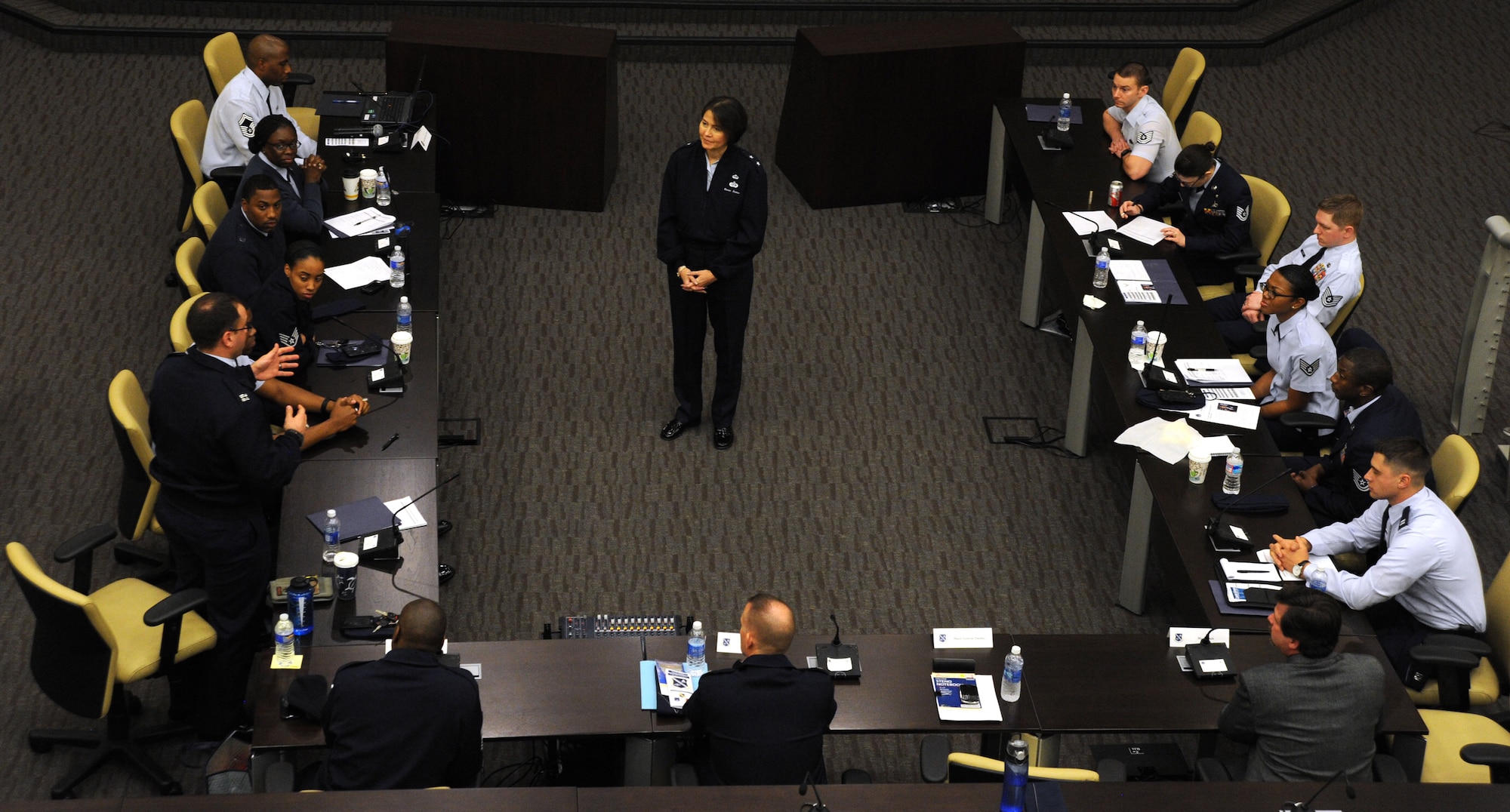 A Capital Airmen Development Seminar attendee gives feedback to Air Force District of Washington Commander Maj. Gen. Sharon K.G. Dunbar about the seminar at the General Jacob E. Smart Center on Joint Base Andrews, Md., Dec. 5, 2013. Airmen who attended the semiar had the opportunity to learn from several key Air Force leaders who briefed throughout the seminar including the Acting Secretary of the Air Force, the Vice Chief of Staff of the Air Force and the Administrative Assistant to the Secretary of the Air Force. (U.S. Air Force photo/Tech. Sgt. Tammie Moore)
 