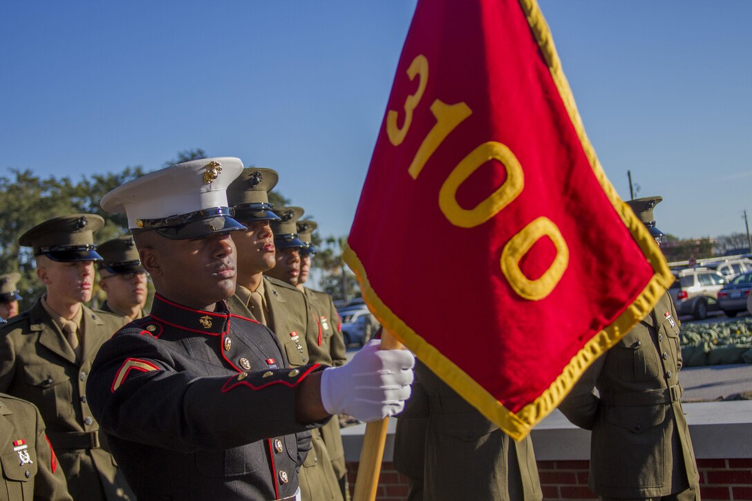 Pfc. Troy Davis, honor graduate for platoon 3100, stands at parade rest before graduation aboard Parris Island, S.C., Dec. 13, 2013. Davis, a native of Gonzales, La., was recruited by Sgt. Henry Martin, recruiter from Recruiting Substation New Orleans, Recruiting Station Baton Rouge. Davis will be able to enjoy some much deserved leave with his family as he prepares for Marine combat training in Camp Geiger, N.C. (U.S. Marine Corps photo by Lance Cpl. John-Paul Imbody)