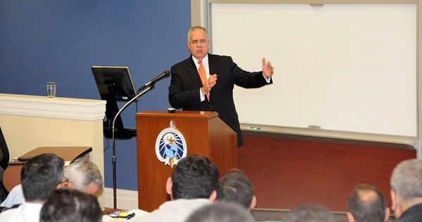 The first joint educational "Strategic Intelligence Day" hosted by NIU and the Inter-American Defense College (IADC) last week featured special guest speaker Deputy Director of DIA David Shedd, who spoke about the challenges of intelligence at the strategic national level in today's ever changing world. "The students, senior and future leaders who represent 15 countries, were astonished that the Deputy Director of DIA would speak so candidly and answer all their questions without pulling any punches," said event host Eric Hammersen, NIU VP of the Office of Outreach.  
