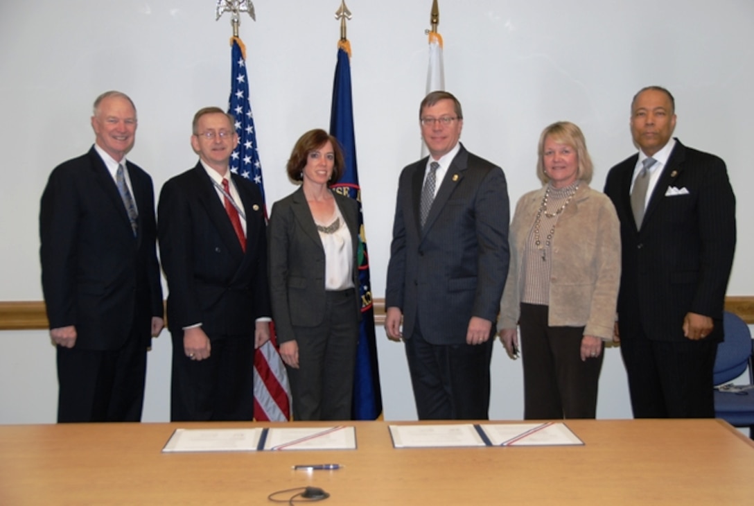 "This agreement adds a valuable new perspective to classroom discussion — that of law enforcement intelligence — to build on our education," said Dr. David Ellison, NIU president. "DEA plays an integral part in national security, homeland security, law enforcement and counterterrorism." Pictured from left to right: Dr. David Ellison; Dr. Barry Zulauf, Office of the Director of National Intelligence chair to NIU; Julie Mendosa '09, DEA chair to NIU; Assistant Administrator Rodney Benson, chief of intelligence for the DEA; Dr. Susan Studds, NIU provost; and William Walker '02, deputy assistant administrator, DEA Office of Intelligence. 