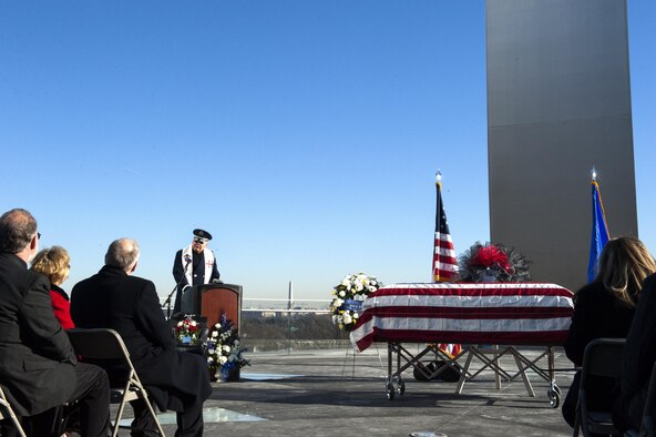 Chaplain (Col.) David Fitz-Patrick speaks to the family of Col. Francis McGouldrick Jr. during a celebration of life ceremony Dec.  13, 2013, at the Air Force Memorial, Arlington, Va. McGouldrick Jr. was declared missing in action during his service in Laos following a mid-air collision while serving as the navigator on a B-57 Canberra on Dec. 13, 1968. (U.S. Air Force photo/Staff Sgt. Carlin Leslie)