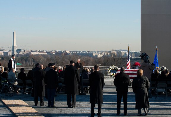 Randal Hill speaks during a celebration of life ceremony for Col. Francis McGouldrick Jr. Dec. 13, 2013, at the Air Force Memorial, Arlington, Va. Hill is the son-in-law of McGouldrick Jr. who was declared missing in action on Dec. 13, 1968 and received a burial with full military honors at Arlington National Cemetery. (U.S. Air Force photo/Staff Sgt. Carlin Leslie)