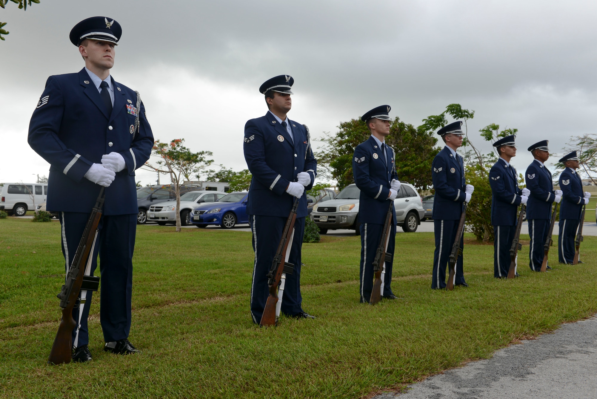 The base honor guard team stands at parade rest prior to performing the twenty-one-gun salute during the Linebacker II ceremony Dec. 13, 2013, on Andersen Air Force Base, Guam. In December 1972, bombers stationed at Andersen flew 729 sorties in 11 days for Operation Linebacker II. (U.S. Air Force photo by Airman 1st Class Emily A. Bradley/Released)