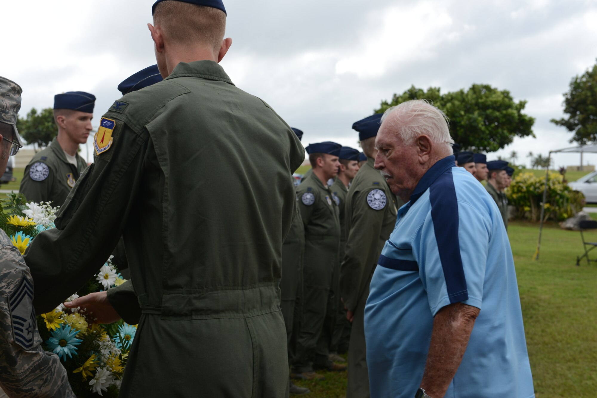 Retired Lt. Col. Charles "Chuck" McManus watches as the ceremonial wreath is placed during the Linebacker II ceremony Dec. 13, 2013, on Andersen Air Force Base, Guam. McManus was a B-52 Stratofortress navigator during Operation Linebacker II in 1972, which led to the end of the Vietnam War. (U.S. Air Force photo by Airman 1st Class Emily A. Bradley/Released)
