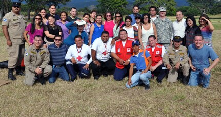 Members of Joint Task Force-Bravo, the Honduran Academy of Pediatrics, the Honduran Red Cross, Honduran first responders, and members of the Permanent Contingency Commission of Honduras (COPECO) pose for a photo at the completion of an American Academy of Pediatric Disaster “Train the Trainer” course at Soto Cano Air Base, Honduras, Dec. 13, 2013. The three-day course provided training in the planning for and care of pediatric populations post-disaster. (U.S. Air Force photo by Capt. Zach Anderson)
