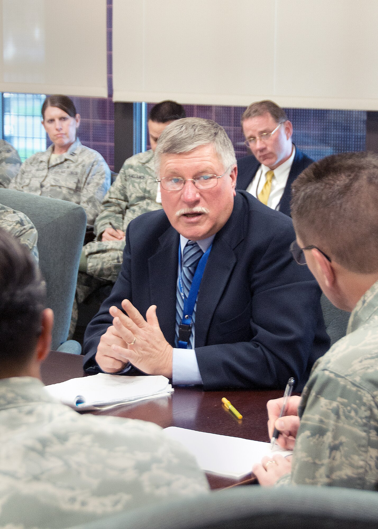 Larry Kachik, Joint Commission Inspection team chief, speaks Dec. 12 during a post-inspection briefing at David Grant USAF Medical Center. “We found no direct findings during our survey and that has never happened to me before,” he said. “DGMC really took full advantage of the survey team and listening for and asking for ways to improve the care they provide to their beneficiaries.” The facility expects to be “fully accredited to provide all services” once the Joint Commission Office reviews the survey teams report. (U.S. Air Force photo/T.C. Perkins)