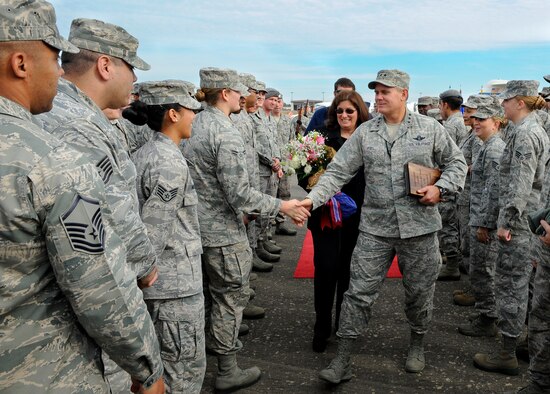 Lt. Gen. Eric Fiel, Air Force Special Operations Command commander, shakes hands with enlisted Air Commandos after being nominated for the Order of the Sword at Hurlburt Field, Fla., Dec. 13, 2013. The Order of the Sword is the highest honor the enlisted corps can bestow upon an individual. (U.S. Air Force photo/Airman 1st Class Jeff Parkinson)