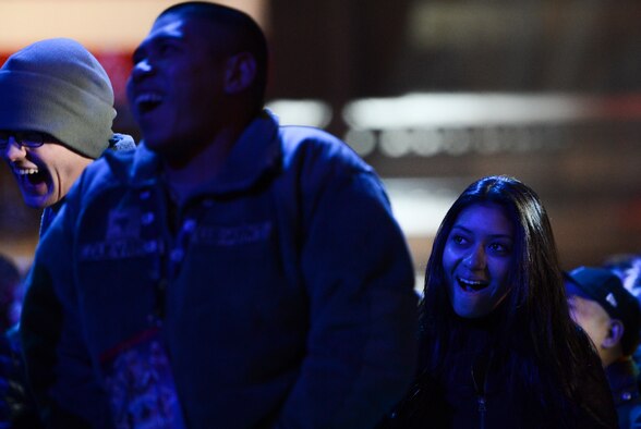 Audience members react to a joke by comedian Jeff Dunham, Dec. 11, 2013, at the the WWE Tribute to the Troops event at Joint Base Lewis-McChord, Wash. Approximately 4,000 service members and family members were treated to the event featuring 40 WWE superstars and divas. (U.S. Air Force photo/Tech. Sgt. Sean Tobin)