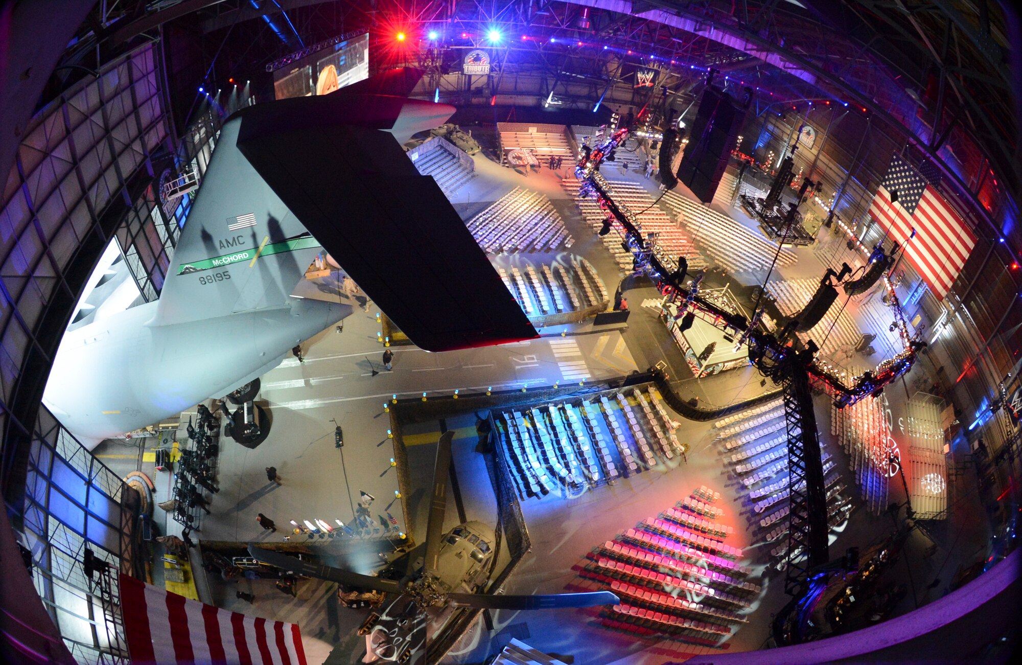 A final check of lighting and sound is performed prior to opening the doors to ticket holders, Dec. 11, 2013, at the WWE Tribute to the Troops event at Joint Base Lewis-McChord, Wash. McChord Field's hangar four was transformed into a wrestling arena in which 4,000 service members and family members were treated to a free show which included live music and comedy performance interspersed among wrestling matches. (U.S. Air Force photo/Tech. Sgt. Sean Tobin)
