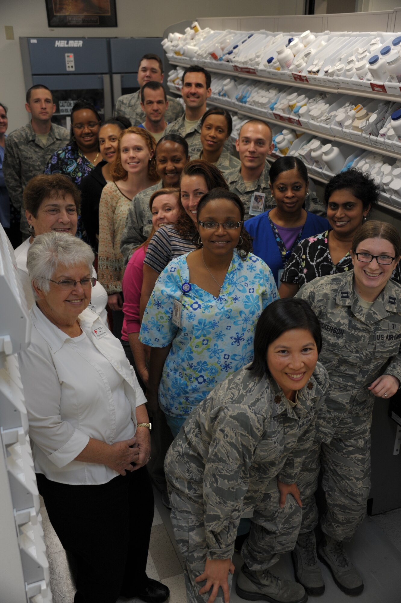 Maxwell's pharmacy poses for a group photo, Nov. 6. Filling more than 1,500 prescriptions daily, the staff of Airmen and civilians operate the second busiest pharmacy within Air Education and Training Command, according to pharmacy leadership.(U.S. Air Force photo by Airman 1st Class William Blankenship)