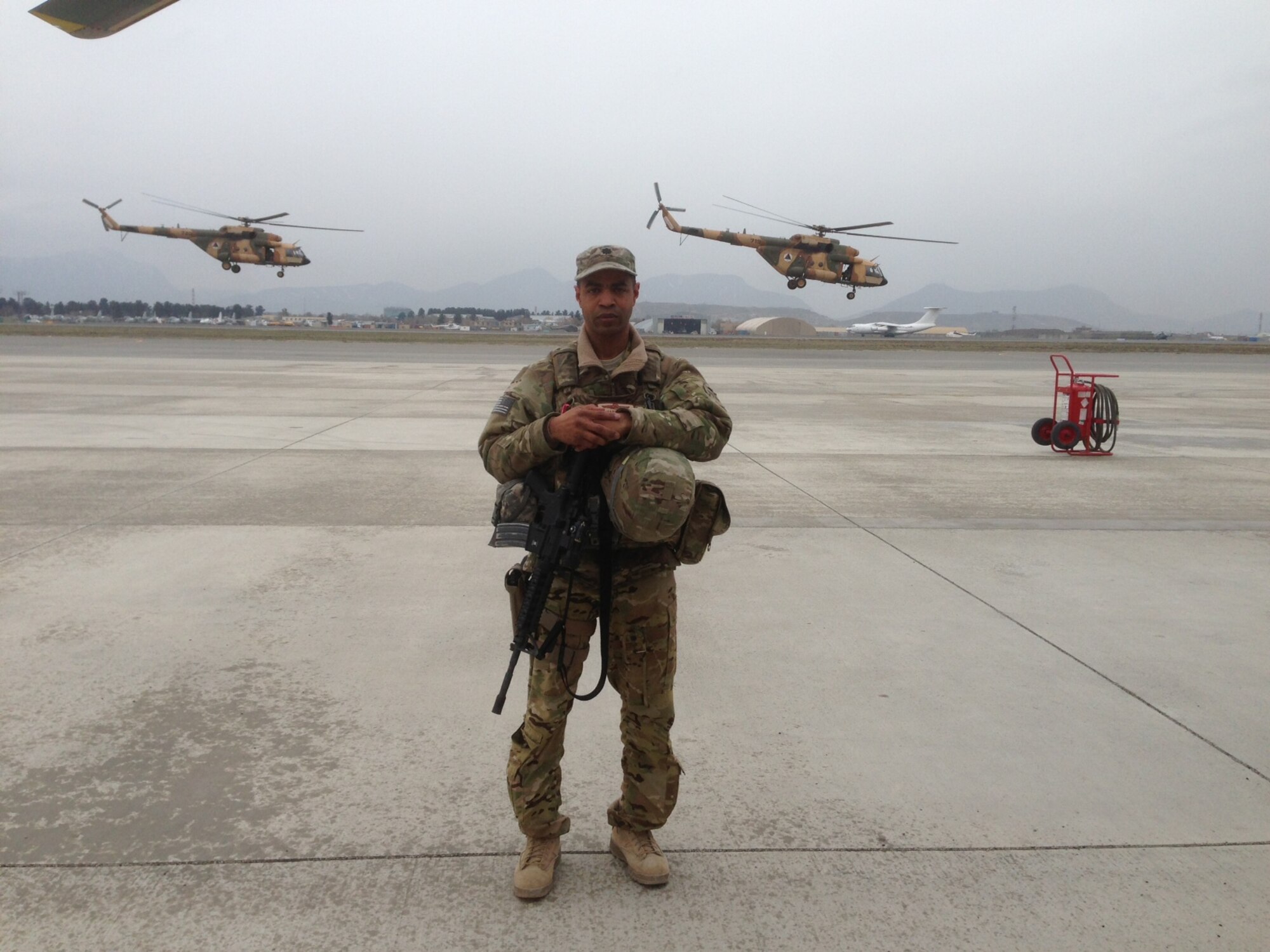 Lt. Col. Howard Gentry stands on the 438th Expeditionary Wing airfield in Kabul, Afghanistan, in 2012. 