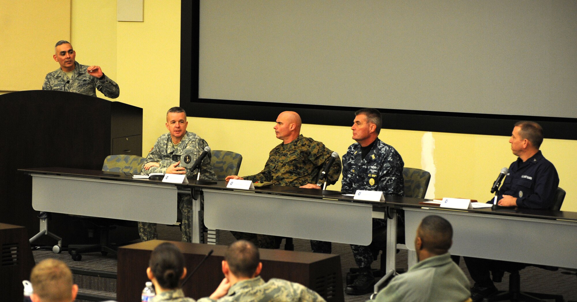 Air Force District of Washington Command Chief Master Sgt. Jose LugoSantiago serves as moderator during the 2013 Capital Airmen Development Seminar Senior Enlisted Panel at the General Jacob E. Smart Center on Joint Base Andrews, Md., Dec. 3, 2013. From left to right, the panel consisted of Army Military District of Washington Command Sgt. Maj. David Turnbull, Marine Headquarters and Service Battalion Sgt. Maj. Craig Cressman, Naval District of Washington Command Master Chief Chris Adams, and Coast Guard National Capital Region Senior Chief Petty Officer William Putman. (U.S. Air Force photo/Tech. Sgt. Tammie Moore)