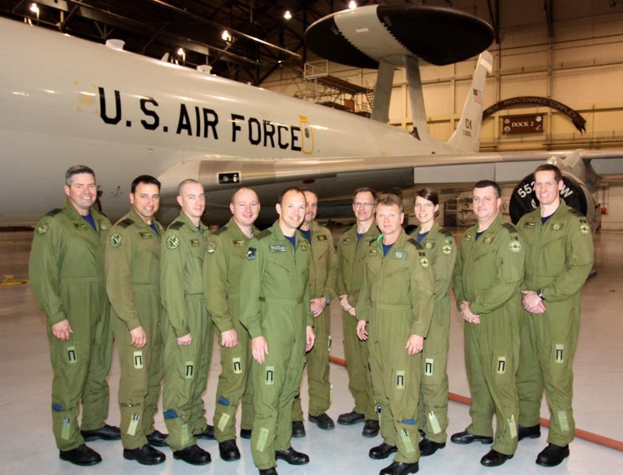 Following a tour of an E-3 Sentry Nov. 21, Brig. Gen. Alain Pelletier, deputy commander of Continental NORAD, poses with members of the 552nd Air Control Wing Canadian Detachment. Pictured are, from left, Lt. Col. Peter Dozois, Canadian Detachment commanding officer; Capt. Michel Gagnon, navigator; Sgt. Raymond Moggy, communication technician; Warrant Officer Jason Verge, airborne radar technician; General Pelletier; Capt. Gareth Carter, air surveillance officer; Sgt. Jason Murray, flight engineer; Maj. Bradley Little, mission crew commander; Capt. Vanessa Larochelle-Meilleur, air weapons officer; Warrant Officer Robert McKendry, senior surveillance technician; and Capt. Matthew Allan, senior director. (Courtesy photo)