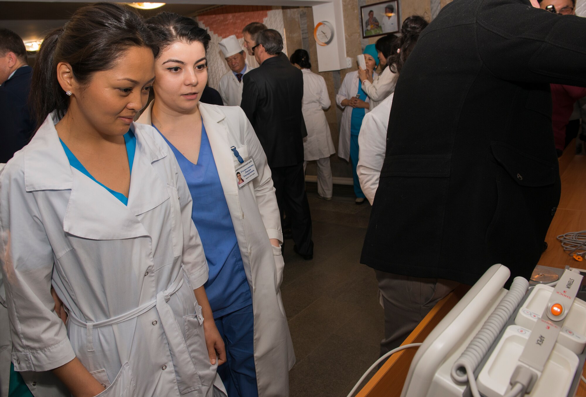 Local nurses view a medical defibrillator after a medical equipment dedication ceremony at a woman’s prenatal clinic in Bishkek, Kyrgyzstan, Dec. 11, 2013. The medical equipment donated consisted of 46 electrocardiograms (EKG) machines, five defibrillators and five bedside monitors, worth about $132,000.  The medical supplies will help aid in the prevention and detection of cardiovascular disease, which is the leading cause of death in Kyrgyzstan (nearly 50 percent). (U.S. Air Force photo/Staff Sgt. Travis Edwards)