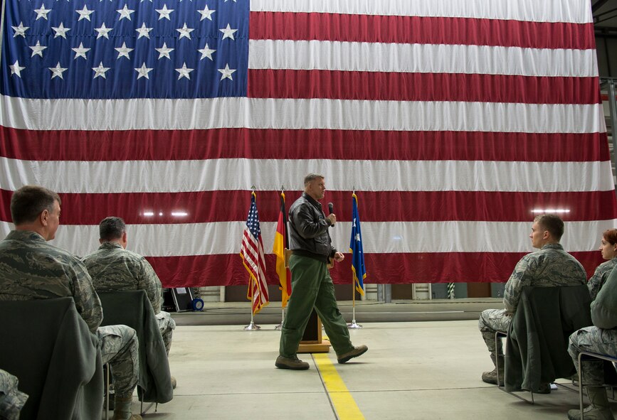 Gen. Frank Gorenc, U.S. Air Forces in Europe and Air Forces Africa commander, addresses members of the 86th Airlift Wing during an all call Dec. 3, 2013, Ramstein Air Base, Germany. After a day of touring the base, Gorenc took time to answer questions and discuss concerns from the audience about the state of the Air Force. (U.S. Air Force photo/Senior Airman)