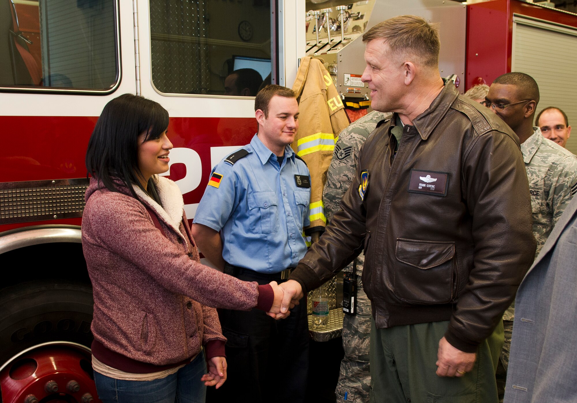 Gen. Frank Gorenc, U.S. Air Forces in Europe and Air Forces Africa commander, meets Zuly Serrano, 86th Civil Engineer Squadron unit program coordinator, during an immersion tour Dec. 3, 2013, Ramstein Air Base, Germany. Immersion tours are held as a way for senior leaders to gain a greater understanding and perspective on how Airmen operate day-to-day. (U.S. Air Force photo/Senior Airman Jose L. Leon)