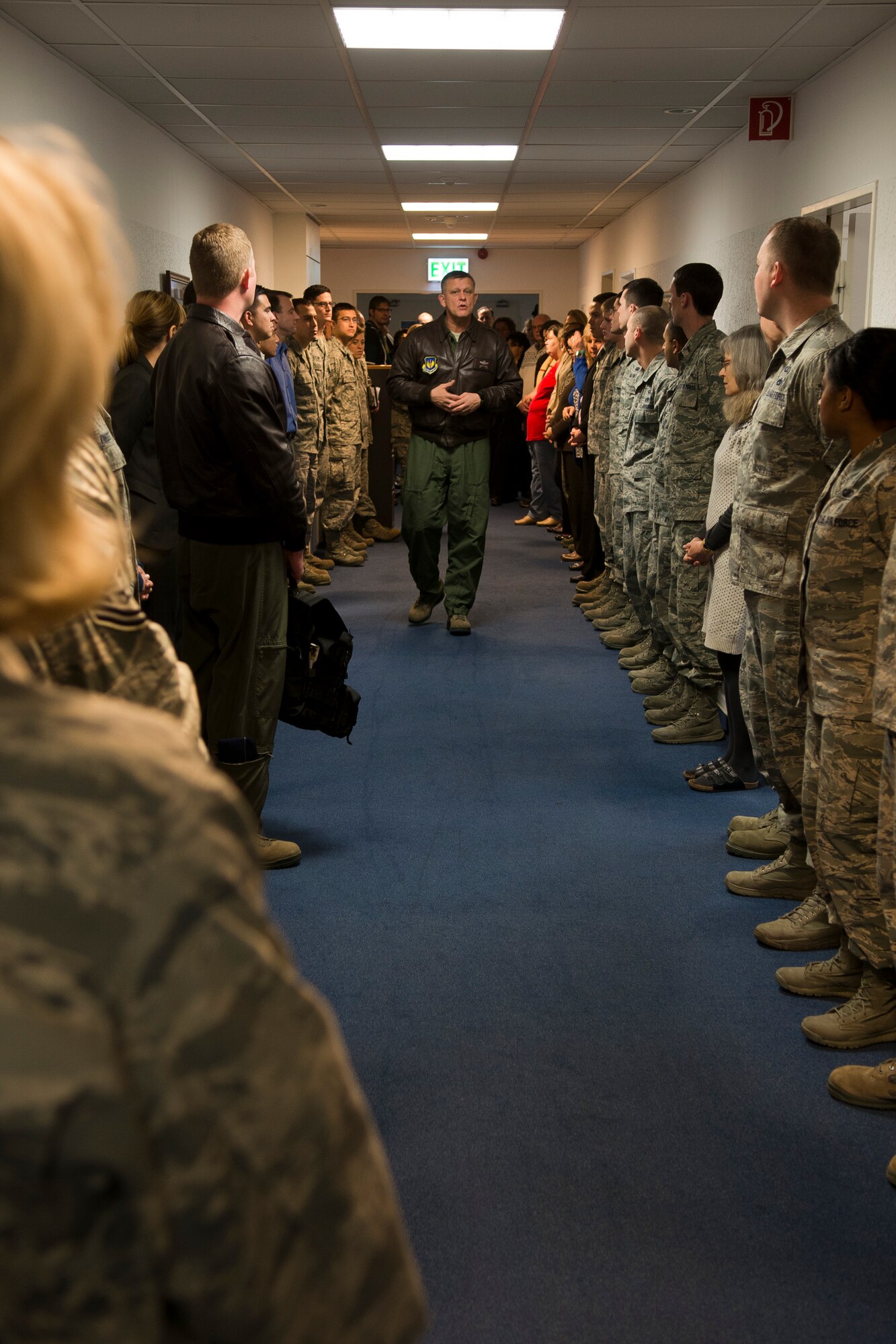 Gen. Frank Gorenc, U. S. Air Forces in Europe and Air Forces Africa commander, talks with members of the 700th Contracting Squadron during an immersion tour Dec. 3, 2013, Ramstein Air Base, Germany. Immersion tours are held as a way for senior leaders to gain a greater understanding and perspective on how Airmen operate day-to-day. (U.S. Air Force photo/Senior Airman Jose L. Leon)