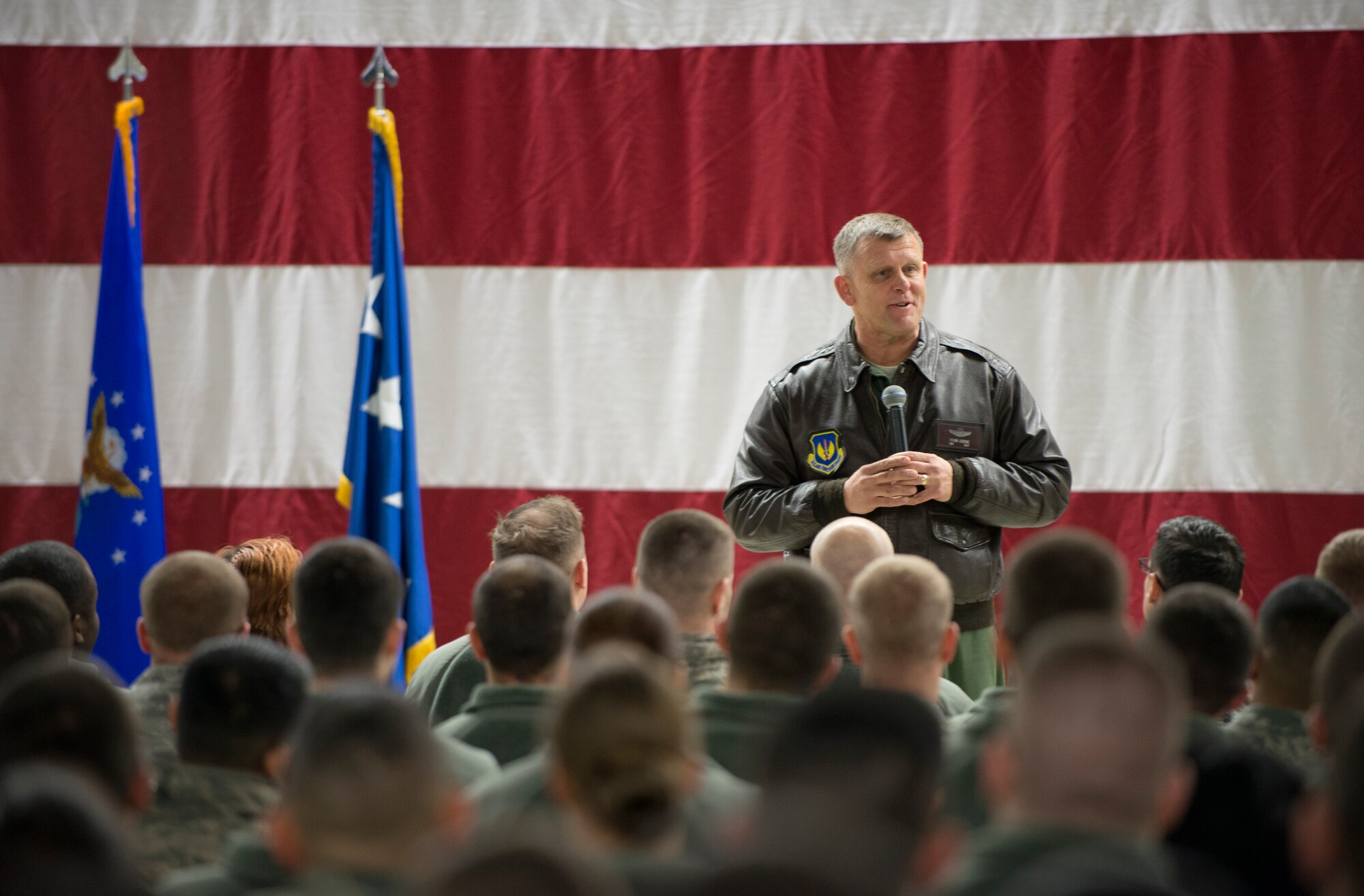 Gen. Frank Gorenc, U.S. Air Forces in Europe and Air Forces Africa commander, addresses members of the 86th Airlift Wing during a commander's call Dec. 3 on Ramstein. After a day of touring the base, Gorenc took time to answer questions and discuss concerns from the audience about issues concerning the Air Force. (U.S. Air Force photo/Senior Airman Jose L. Leon)