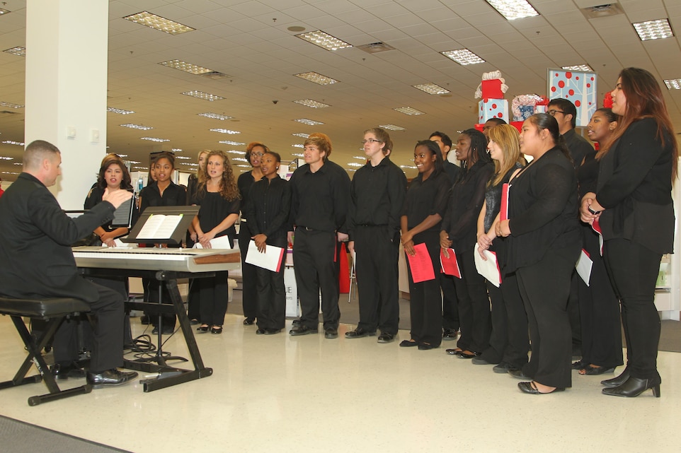 Students with the Twentynine Palms High School Select Choir sing Christmas carols during a performance at the Marine Corps Exchange Dec. 7, 2013.