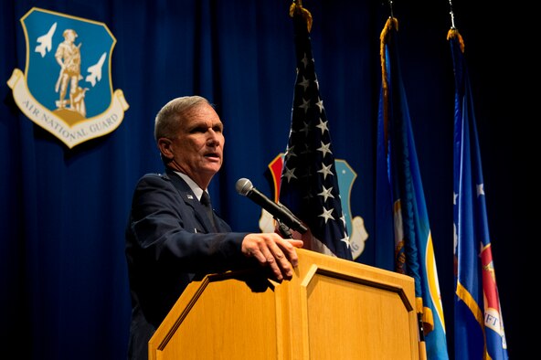 Brig. Gen. Robert Cayton, left, Commander of the Minnesota Air National Guard and Chief of Staff Joint Forces Headquarters gives his holiday address to Airmen of the 133rd Airlift Wing during the annual Wing Awards Ceremony in St. Paul, Minn., Dec 14, 2013. The award ceremony recognizes outstanding Airmen throughout the wing. (U.S. Air National Guard photo by Staff Sgt. Austen Adriaens/Released)
