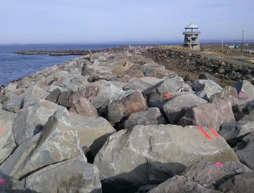 The Seattle District has completed work to repair and restore a 350-foot reach of the Point Chehalis revetment, including a 60-foot reach that could have failed during a severe storm event. The newly repaired section will provide solid protection of the shore line from strong dynamic coastal wave action. About 5,700 tons of large armor stone, 7 to 15 tons each, were carefully keyed into the revetment as part of the $525,000 contract to complete the work by mid December. 